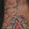 Image : étoile rouge sol pavé <font size=0.3> ©Jacky tatouage</font>